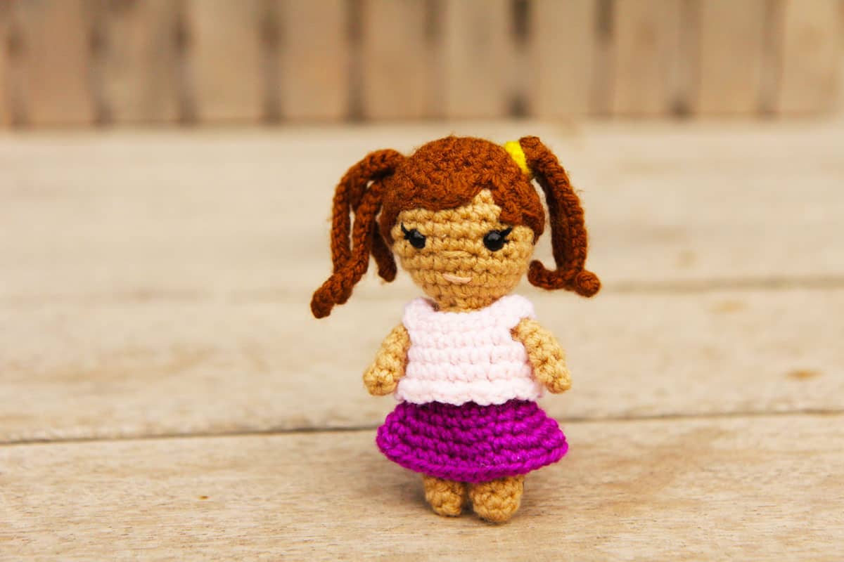 small crochet doll with pigtails